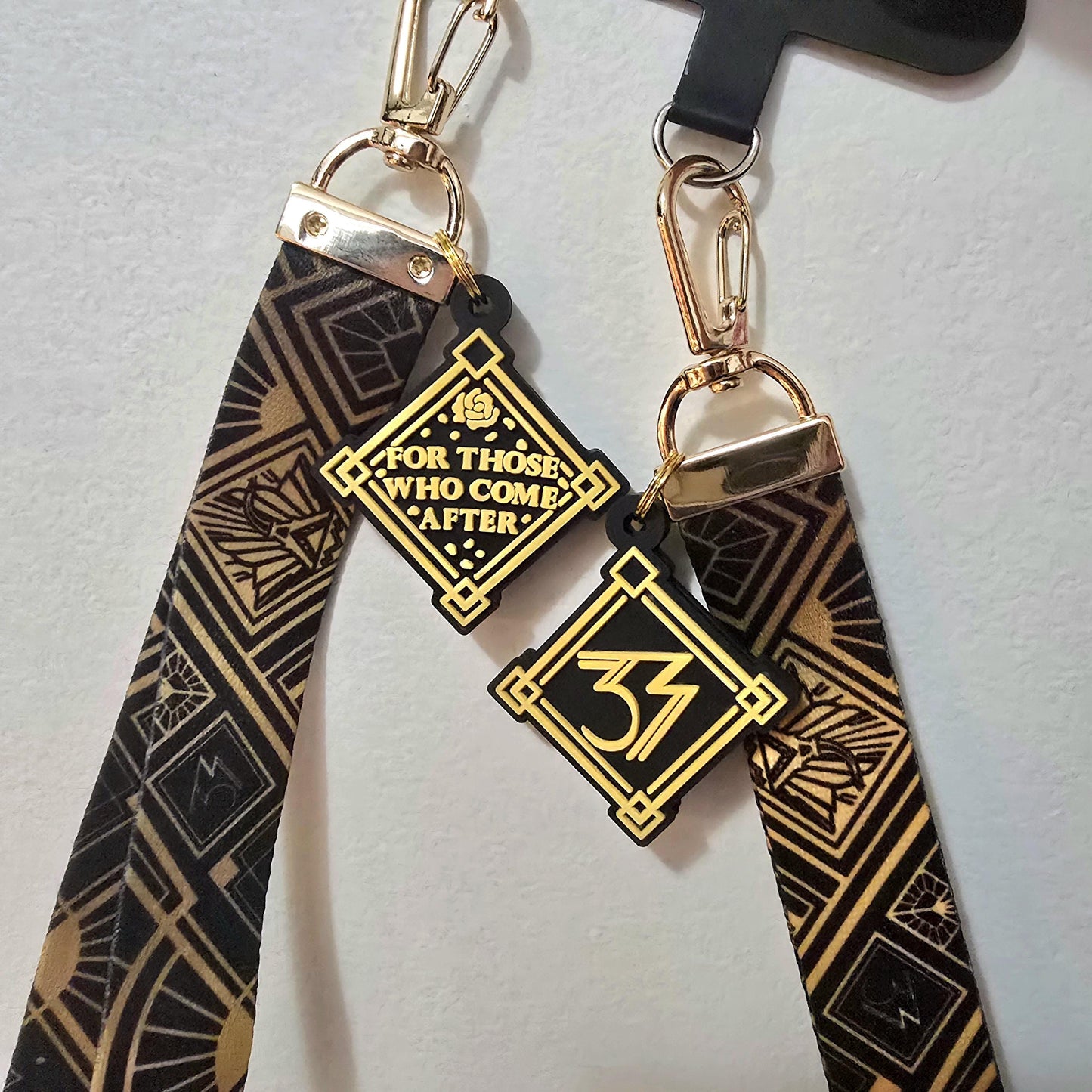 Expedition 33 Wristlet Phone Charm