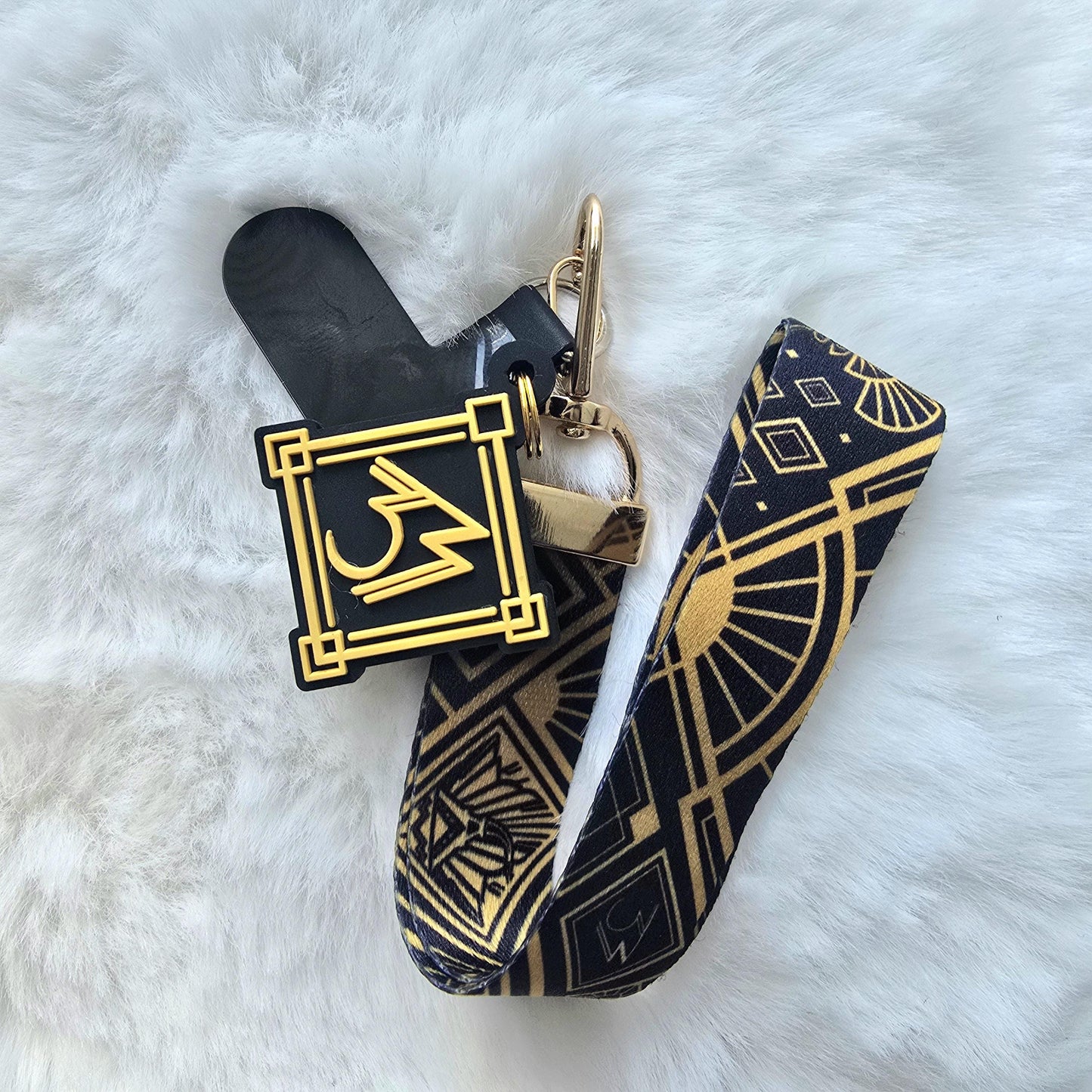 Expedition 33 Wristlet Phone Charm