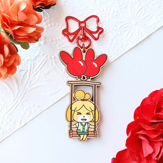 Isabelle Swing Cherry Wood Charm