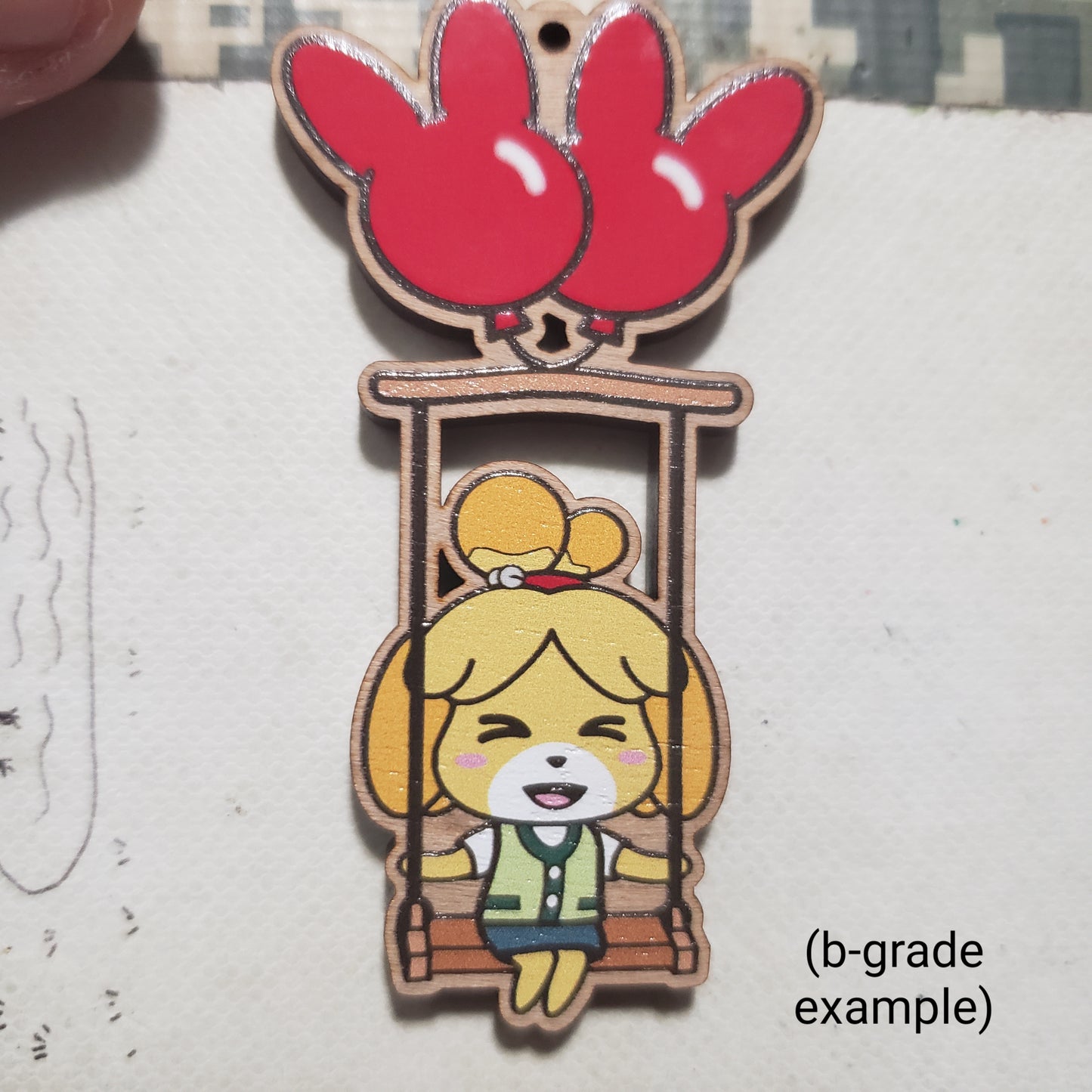 Isabelle Swing Cherry Wood Charm